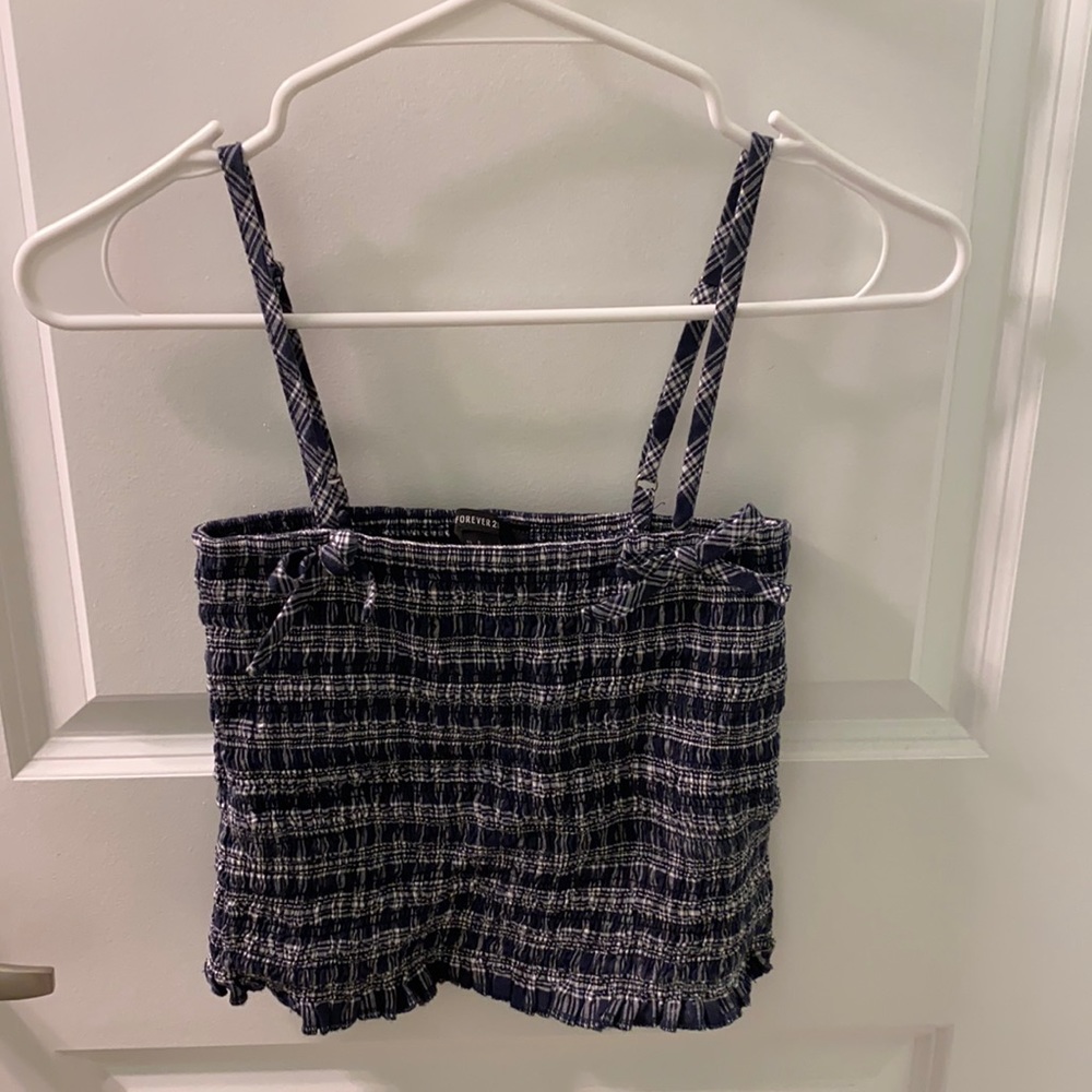 Ruched blue and white plaid crop top with bow detailing. Size XS. Never worn.